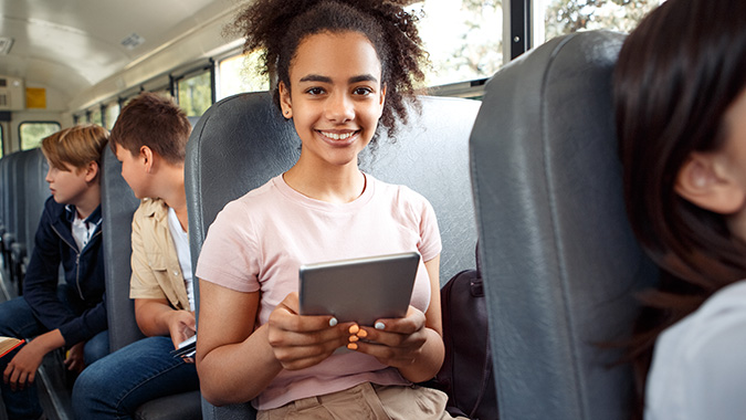 education-bus-girl-on-tablet.jpg